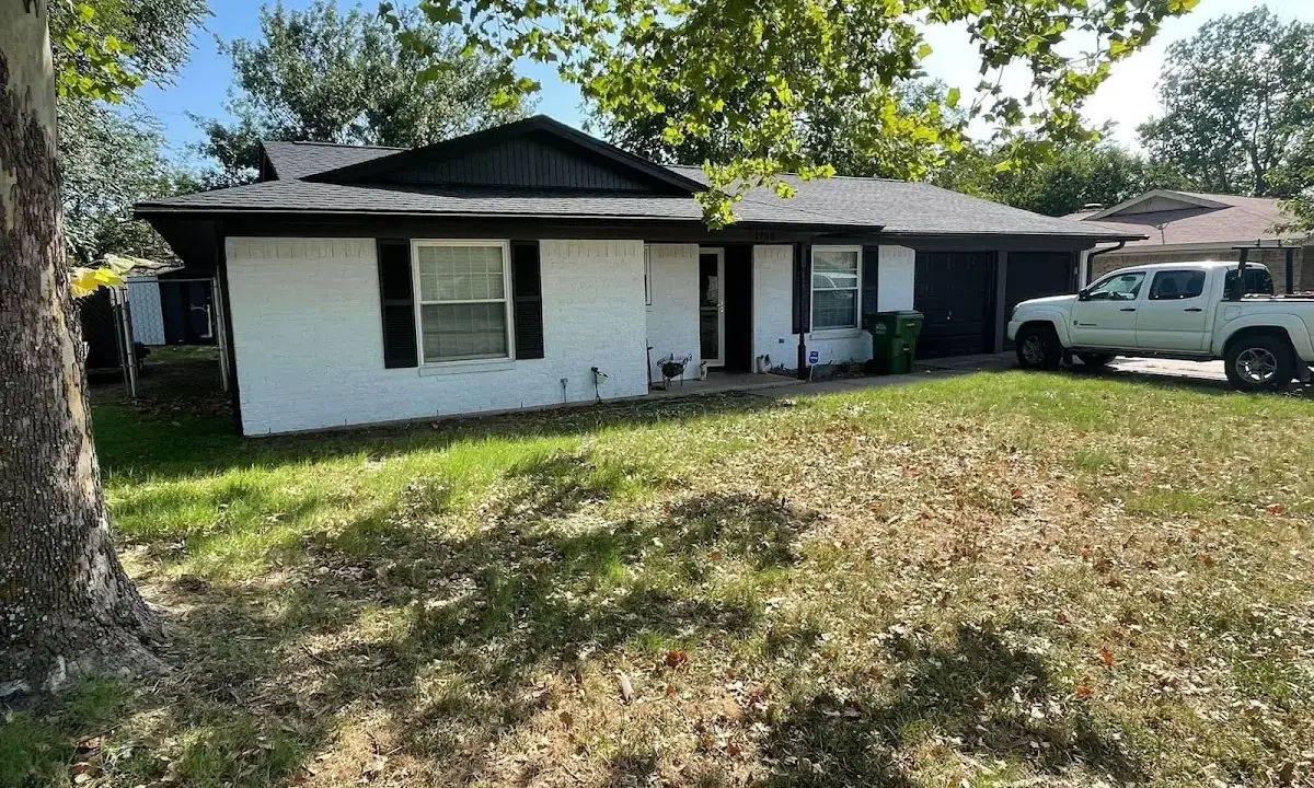 Professional roofing crew working on a residential roof in Murrieta